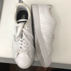 All white adidas sneakers